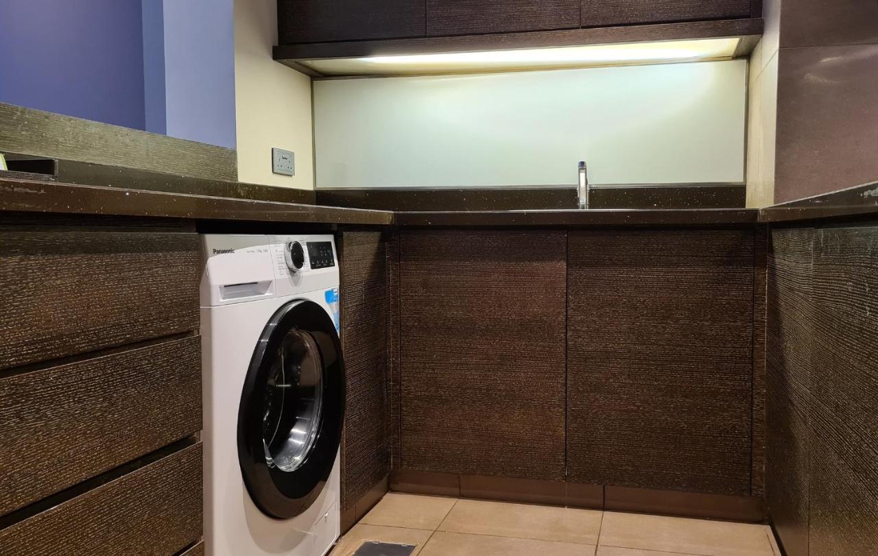 Four Points By Sheraton Аль-Айн Экстерьер фото A laundry room