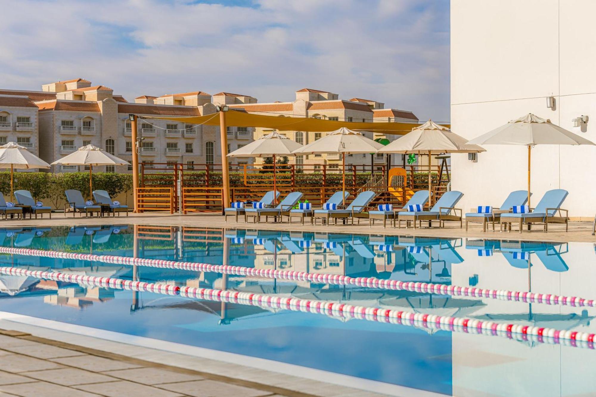 Four Points By Sheraton Аль-Айн Экстерьер фото The pool at the Athens Olympic Aquatic Centre